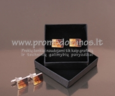 Silver cufflink with amber